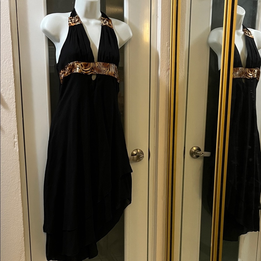 Elegant Black Backless Dress with Gold Accents